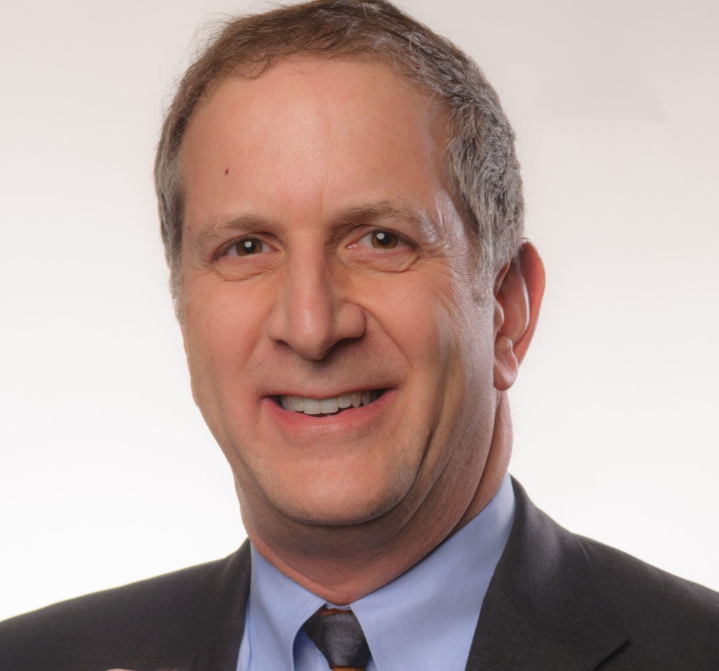 headshot of Daniel Epel smiling